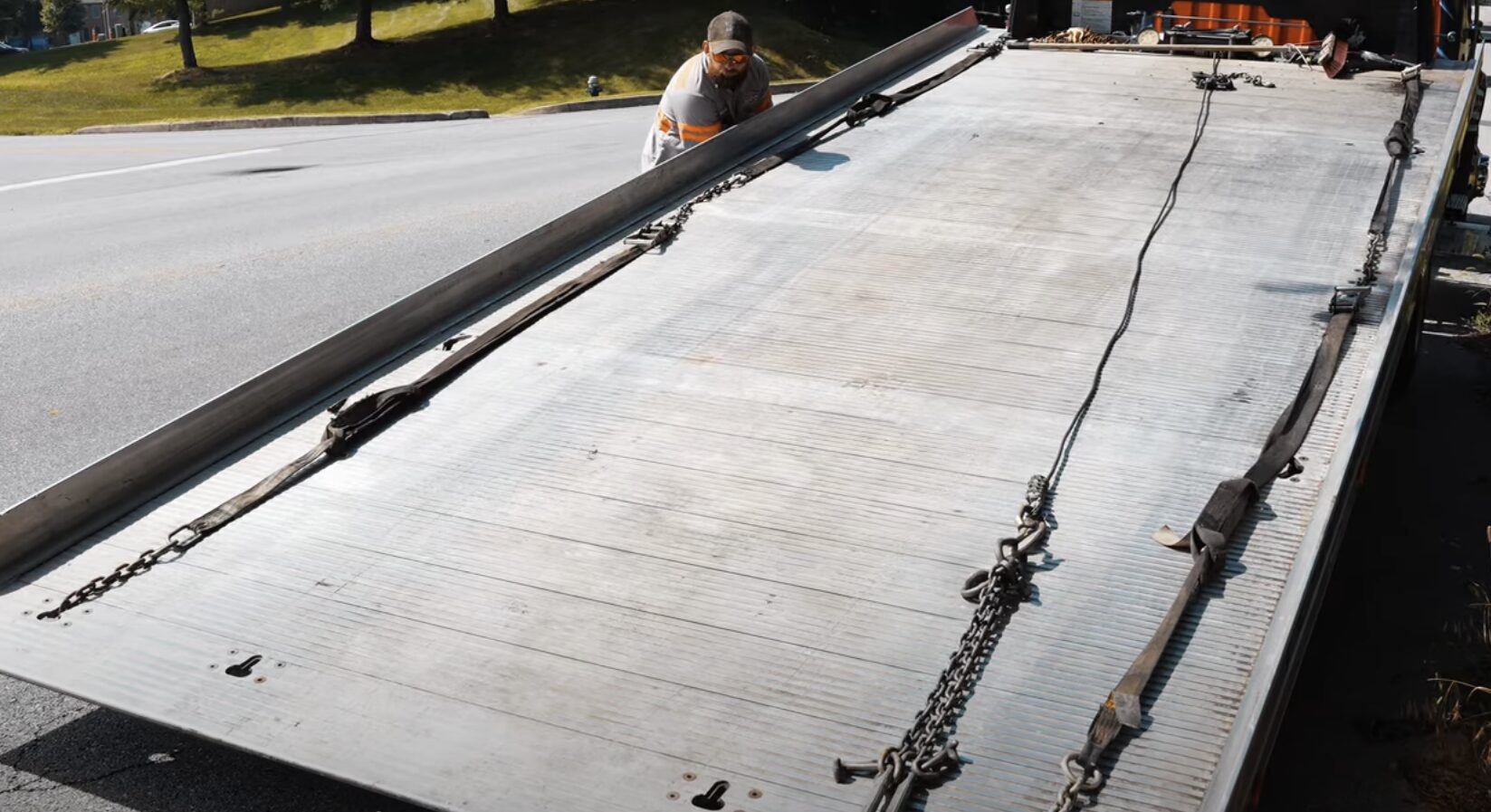 Flatbed Towing Service - Professional vehicle transport by OrbitLane Beavercreek Towing Professional flatbed tow truck with extended loading deck for secure vehicle transport